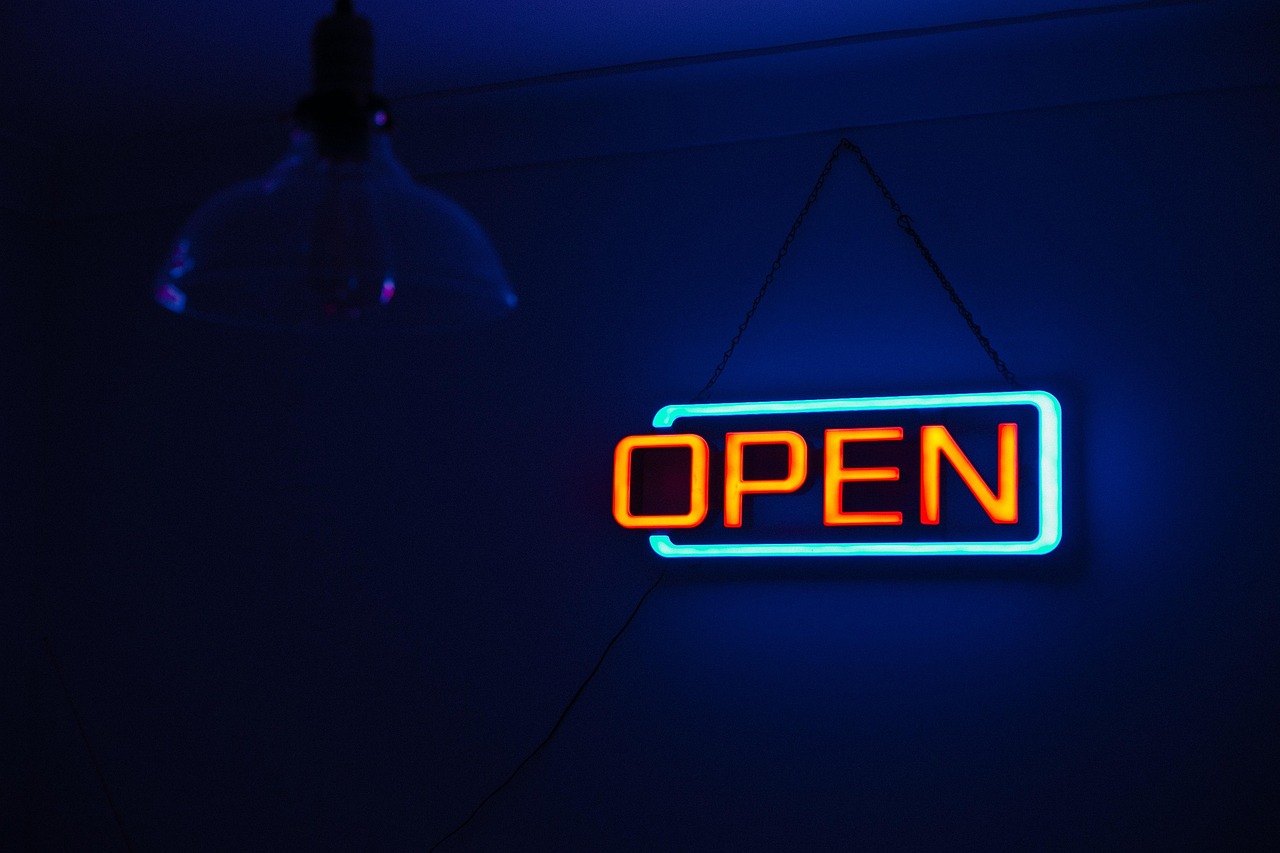 Open sign in a storefront door
