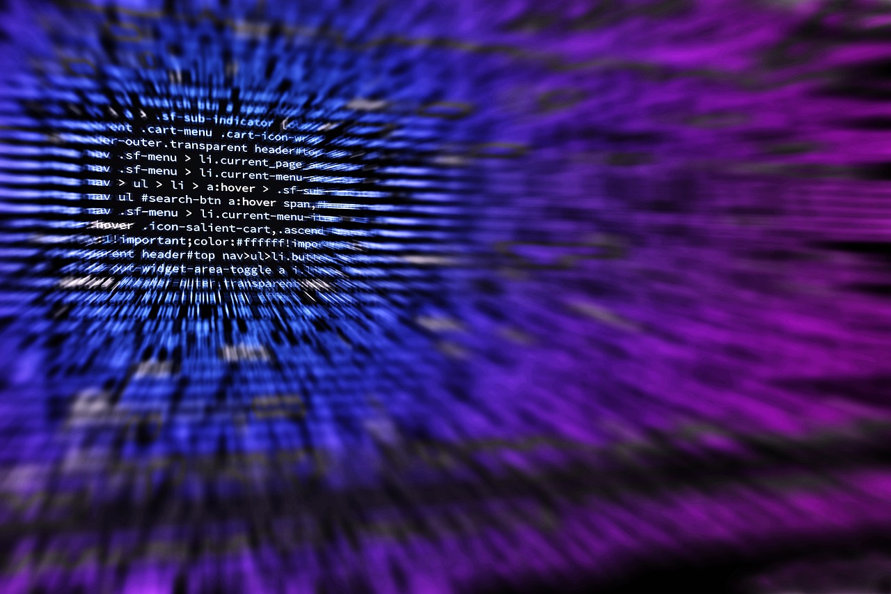 Website code displayed on a monitor
